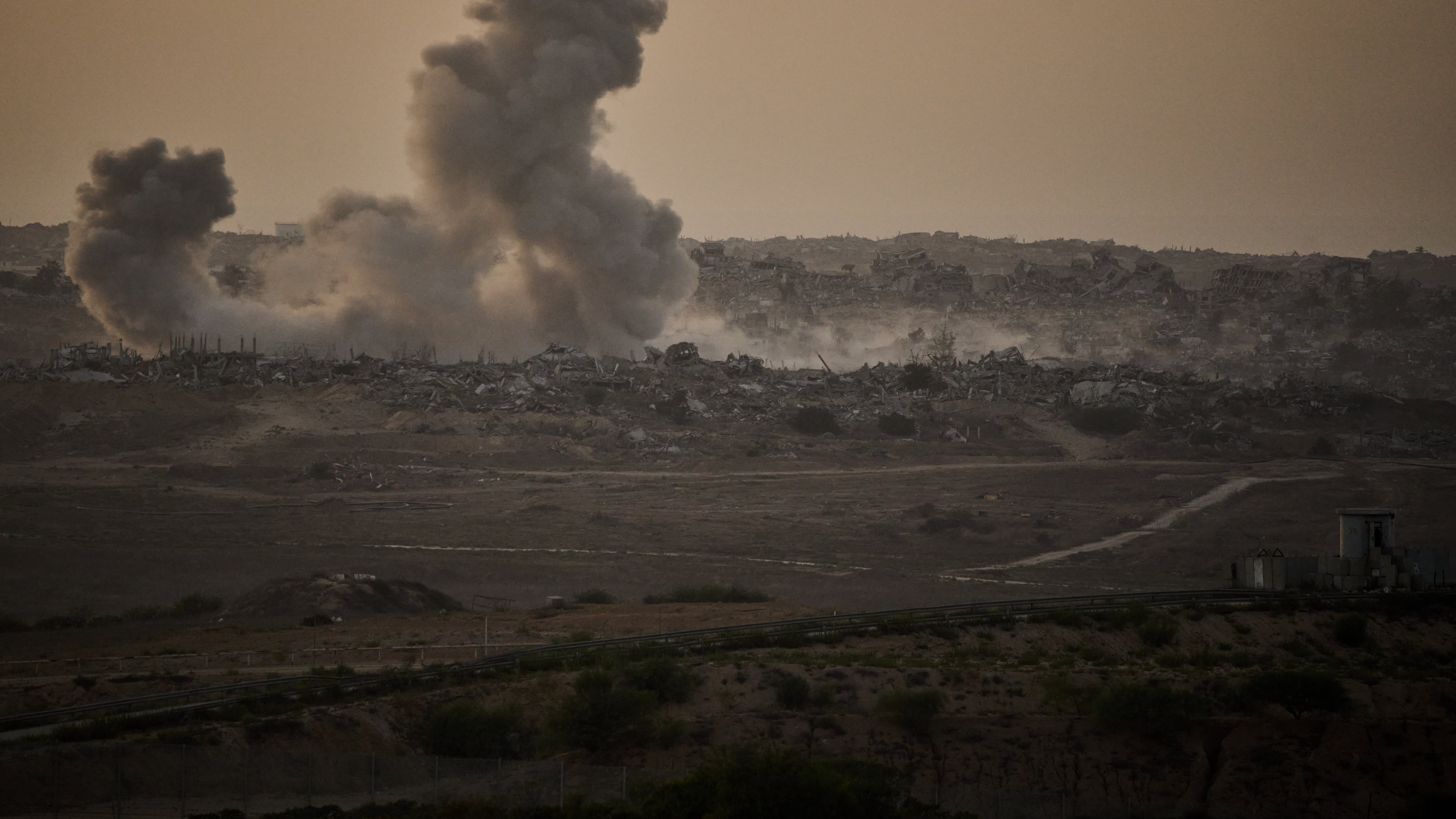 Smoke rises to the sky following an Israeli military strike in the northern Gaza Strip, as seen from southern Israel, Friday, Oct. 3, 2025. (AP Photo/Leo Correa)