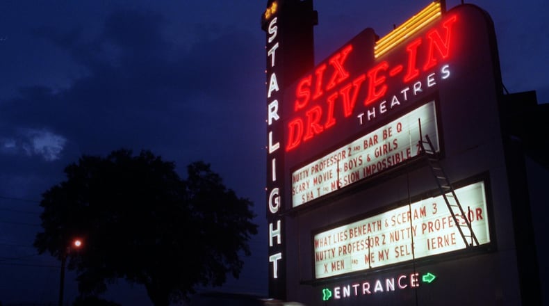 ATLANTA 000802 The Starlight Drivein attracts families on weekday nights to enjoy a night out at the movies. (AJC PHOTO Eustacio Humphrey)