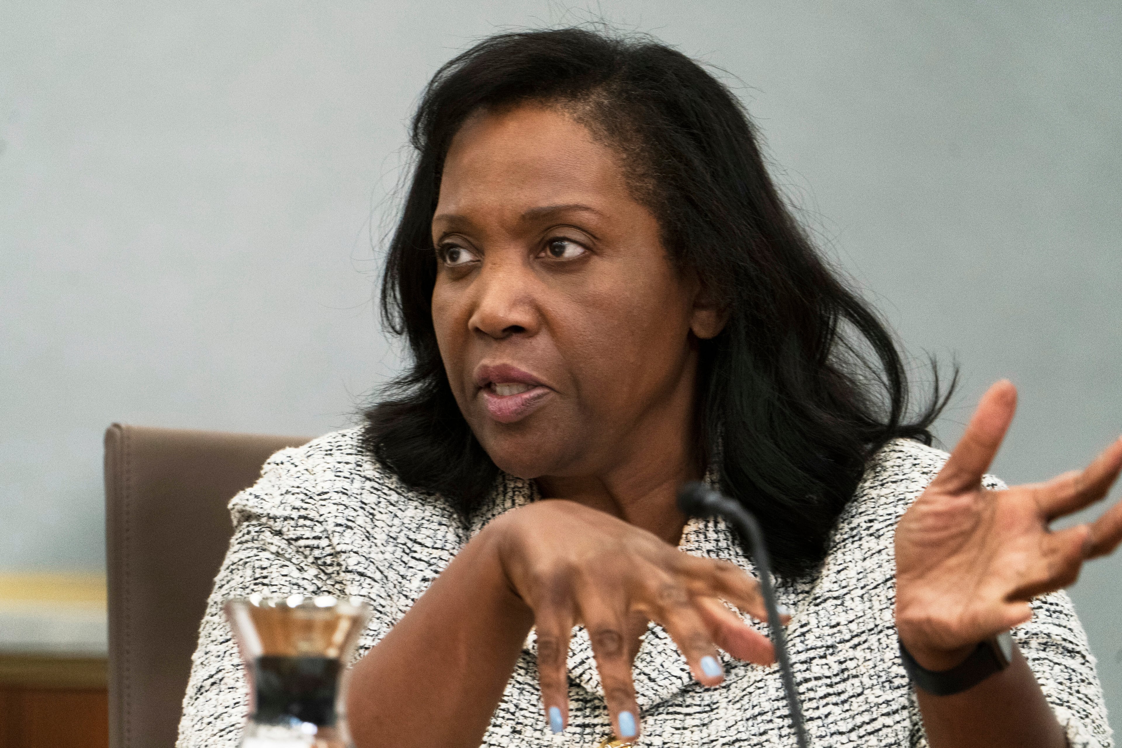 Lisa Cook is a Federal Reserve governor battling against the Trump administration's effort to remove her.