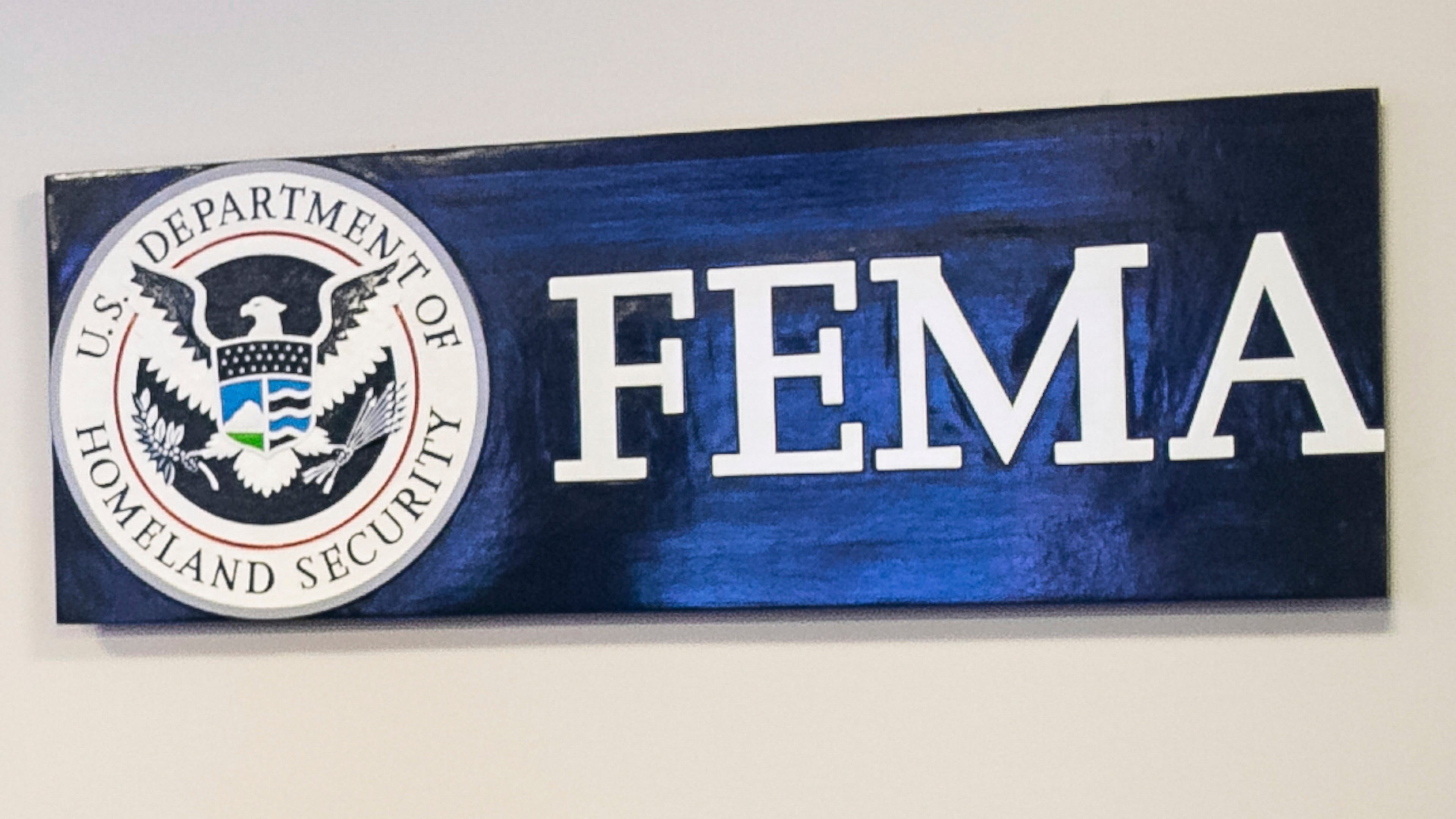 FILE - A sign for the Federal Emergency Management Agency is pictured at FEMA headquarters, April 20, 2020, in Washington. (Al Drago/The New York Times via AP, Pool)