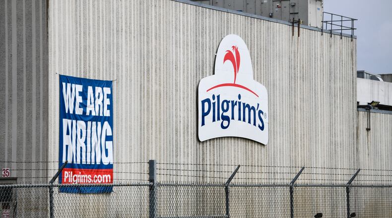 This April 28, 2020 file photo shows the Pilgrim’s Pride plant in Cold Spring. Minn. A federal grand jury has charged four current and former chicken company executives with price-fixing. (Dave Schwarz/St. Cloud Times via AP)