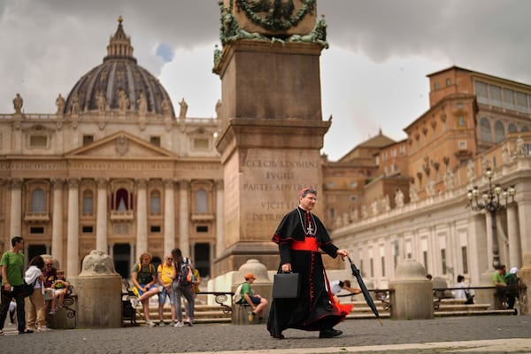 Cardinal Francis Leo walks along St. Peters square, at the Vatican, Monday, May 5, 2025, after attending the General Congregation of cardinals in the New Synod Hall where they are preparing for the upcoming conclave starting on May 7, to elect the 267th Roman pontiff. (AP Photo/Francisco Seco)