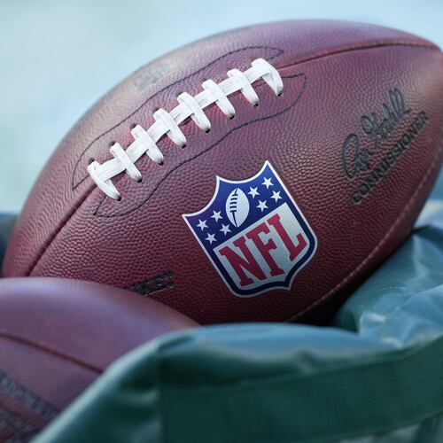 FILE - Footballs are seen before an NFL football game between the Philadelphia Eagles and the Washington Commanders on Jan. 4, 2026, in Philadelphia. (AP Photo/Matt Slocum, File)