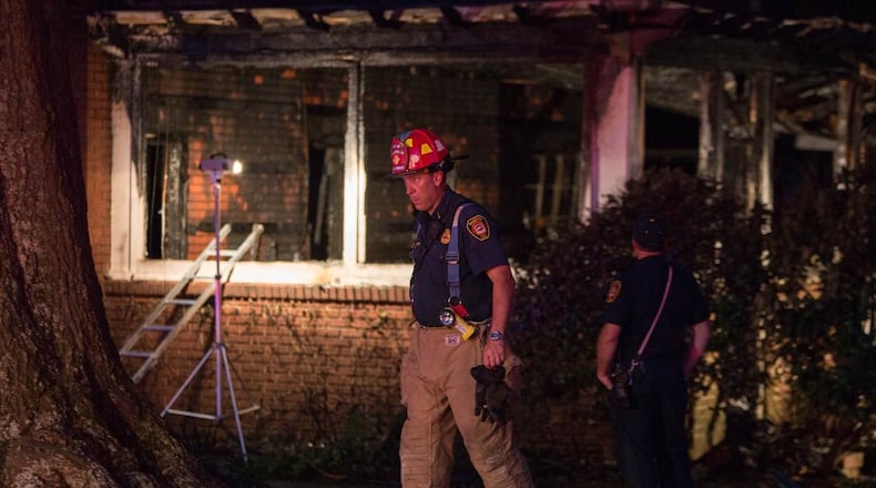 Two sisters died Tuesday after being pulled from a house fire in Marietta. BRANDEN CAMP / SPECIAL