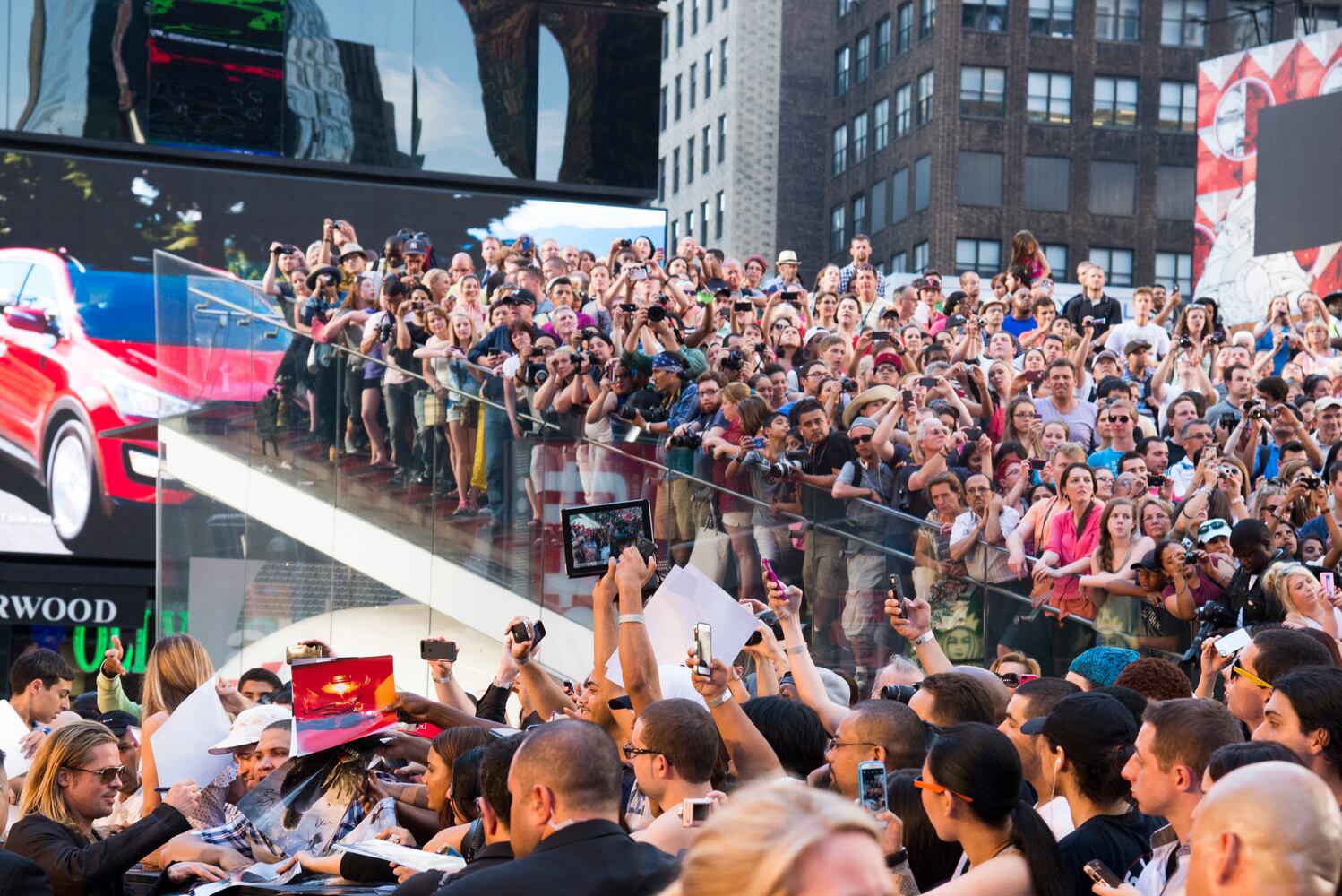 Fans turn out to greet Brad Pitt