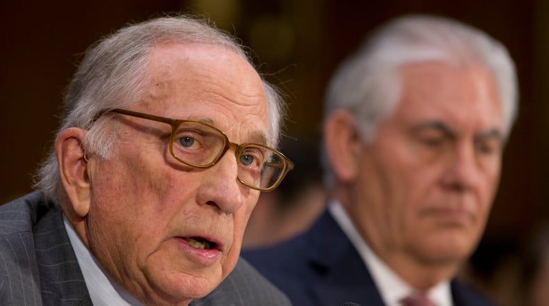 Secretary of State-designate Rex Tillerson listens as right as former Georgia senator Sam Nunn introduces him on Capitol Hill in January. AP/Steve Helber