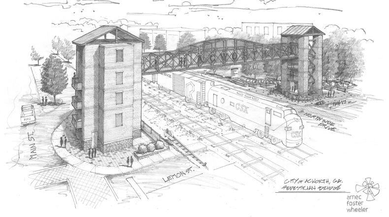 Stairs are being installed for Acworth’s new pedestrian bridge, but the bridge’s setting is still “weeks away.” Courtesy of Acworth