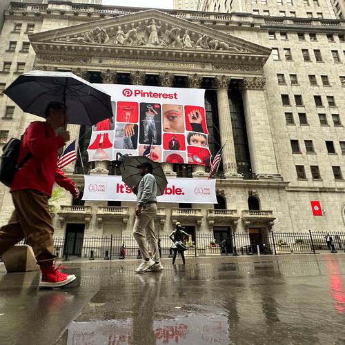 FILE - Banners for Pinterest, displayed to mark the fifth anniversary of the company's listing, hang on the front of the New York Stock Exchange in New York, May 15, 2024. (AP Photo/Peter Morgan, File)
