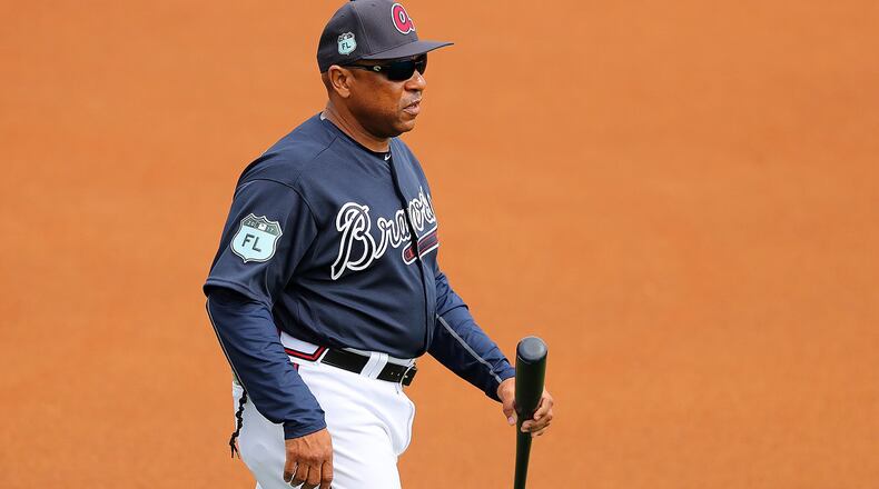 Braves coach Terry Pendleton takes the field for the first full-squad workout at Champion Stadium on Saturday Feb. 18, 2017, at the ESPN Wide World of Sports in Lake Buena Vista, Fla. Curtis Compton/ccompton@ajc.com