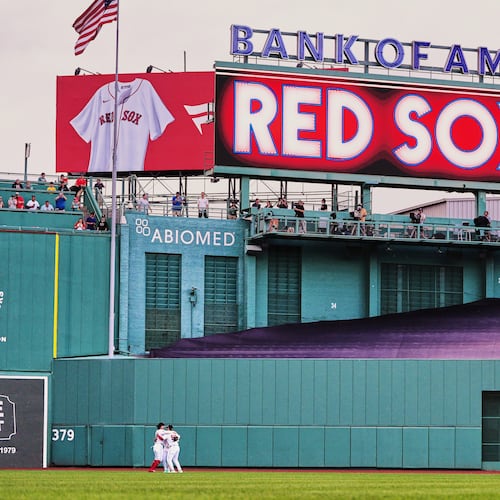 Boston Red Sox outfielders celebrate after defeating the Baltimore Orioles in the first baseball game of a doubleheader, Wednesday, July 22, 2026, in Boston. (AP Photo/Charles Krupa)