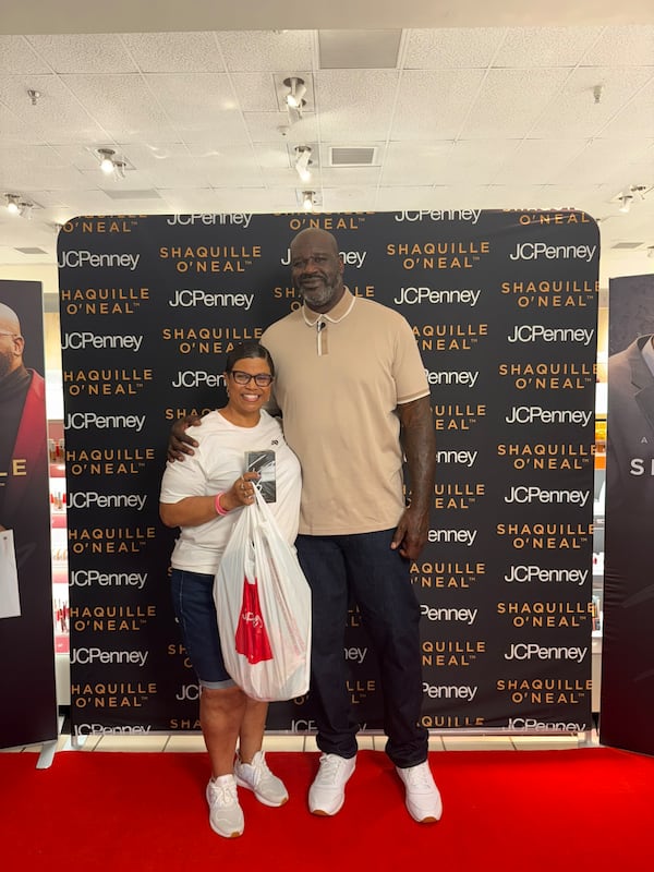 Leilani Fields of Locust Grove waited three hours to meet Shaquille O'Neal. She purchased his cologne even though she admitted "I don't even have a man" to give it to. (Courtesy of Leilani Fields)