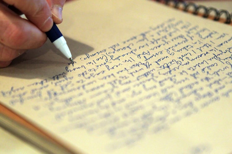 FEBRUARY 28, 2013-ATLANTA: Public art Provocateur, Randy Osborne works on his "Letter A Day" project in his Inman Park apartment on Thurs. 28th, 2013. (Phil Skinner/AJC)