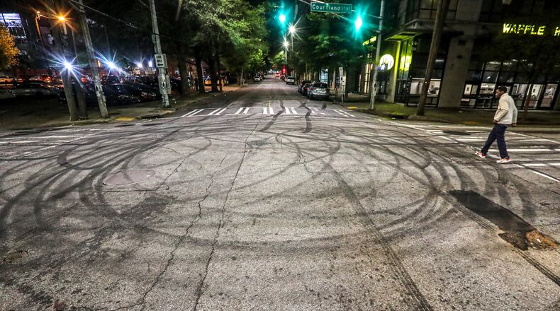 Patches of tire marks swirled across the intersection at Wesley Dobbs Avenue and Piedmont Avenue on Monday morning. The area located in the Georgia State University vicinity was plagued with stunt driving and gunfire over the weekend.