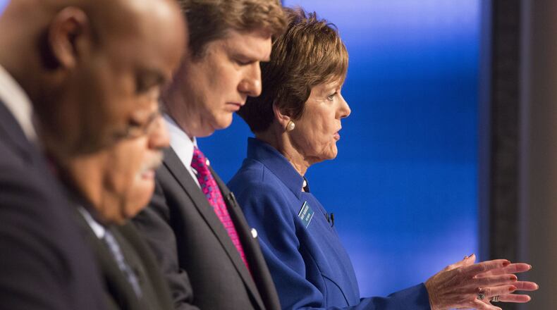 City Councilwoman Mary Norwood, right, reacts to a question from the panel during Sunday’s WSB-TV mayoral debate. Photo by Phil Skinner