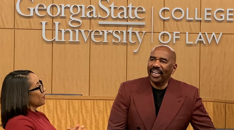 Mo Ivory gave Steve Harvey a special judge's gavel as a gift for speaking to her Georgia State University College of Law class after spending a semester sifting through his legal agreements. RODNEY HO/rho@ajc.com