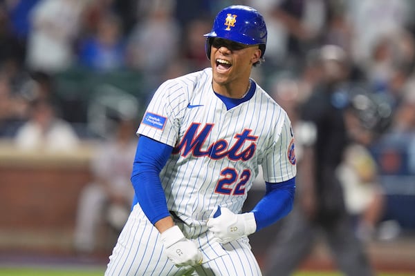 New York Mets' Juan Soto celebrates after hitting a home run during the seventh inning of a baseball game against the Atlanta Braves Wednesday, June 25, 2025, in New York. (AP Photo/Frank Franklin II)