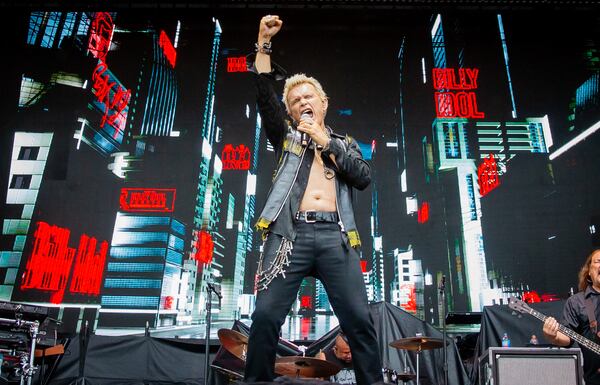 Atlanta, Ga: After a torrential downpour, Billy Idol came through and wowed the crowd with hits. The 68 year old didn't miss a beat despite wireless complications at the beginning of his set. Photo taken Saturday May 5, 2024 at Central Park, Old 4th Ward. AAJC 050524 shaky day three (RYAN FLEISHER FOR THE ATLANTA JOURNAL-CONSTITUTION)