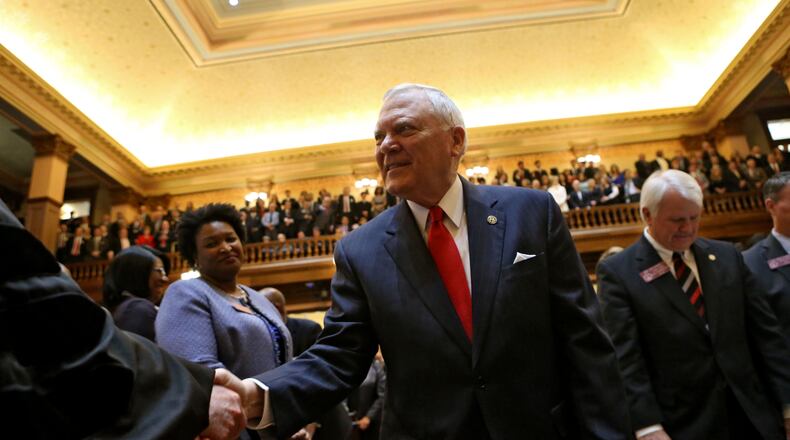 Jan. 13, 2016 - Atlanta - Governor Deal greets Georgia Supreme Court members as he enters the house. Gov. Nathan Deal on Wednesday proposed the largest cost-of-living pay raise for Georgia's more than 200,000 teachers and state employees since before the Great Recession, calling on lawmakers to approve a 3 percent hike. In his sixth State of the State address, the governor promised $300 million more for K-12 schools, following up on the recommendations of a task force he appointed last year to study education funding. BOB ANDRES / BANDRES@AJC.COM