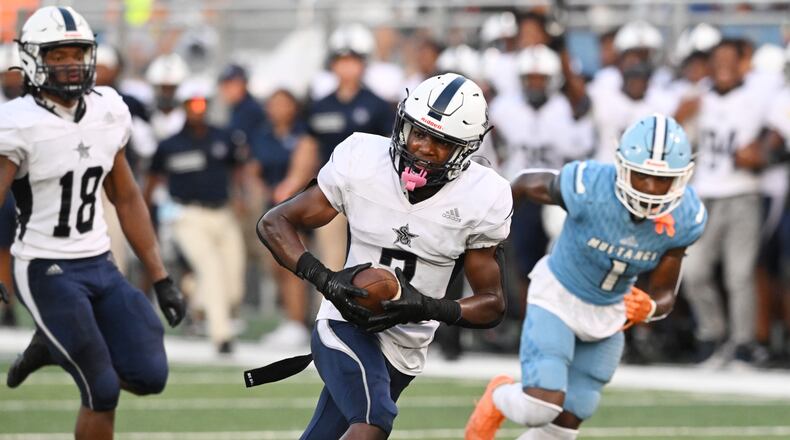 South Gwinnett's Devin Thomas (7) runs for a touchdown during the first half at Meadowcreek High School in Norcross on Friday, August 26, 2022. (Hyosub Shin / Hyosub.Shin@ajc.com)