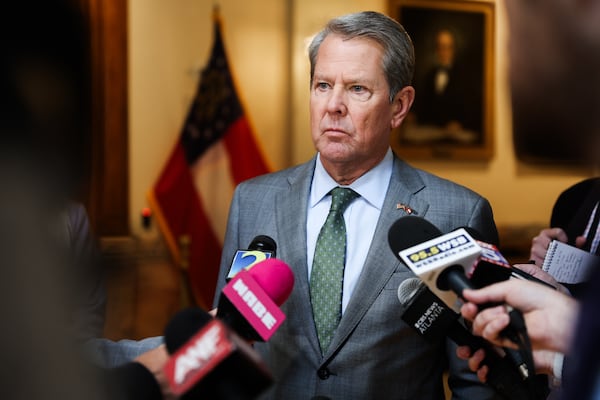 Gov. Brian Kemp speaks with reporters at the Georgia state Capitol in January. (Abbey Cutrer/AJC)