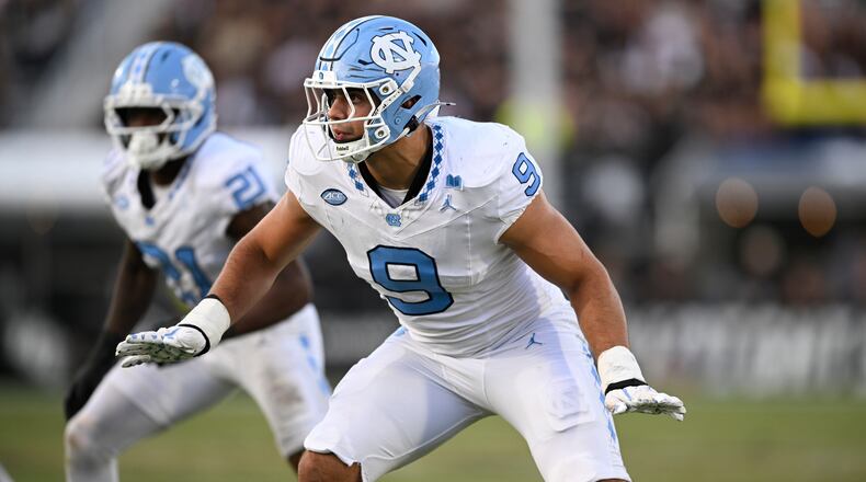 FILE - North Carolina defensive lineman Melkart Abou-Jaoude (9) follows a play against Central Florida during the second half of an NCAA football game, Sept. 20, 2025, in Orlando, Fla. (AP Photo/Phelan M. Ebenhack, File)