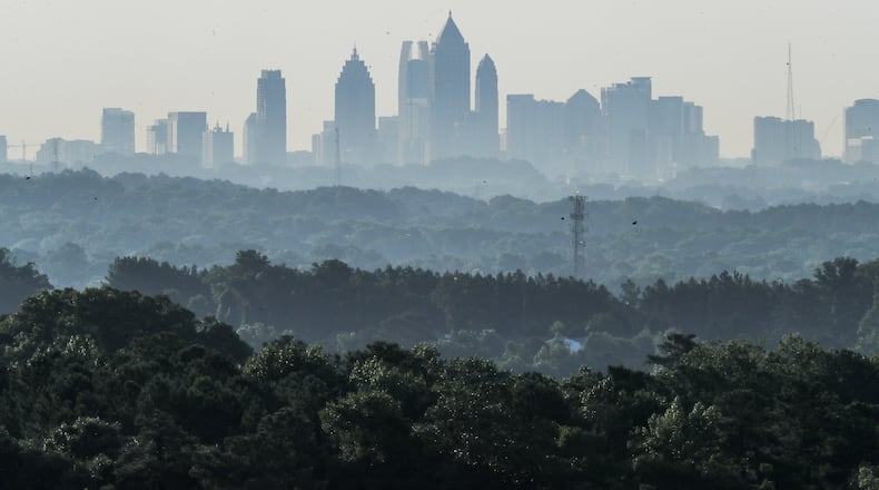 The Atlanta skyline is shown enveloped in haze on Thursday morning, June 16, 2022. (John Spink / John.Spink@ajc.com)