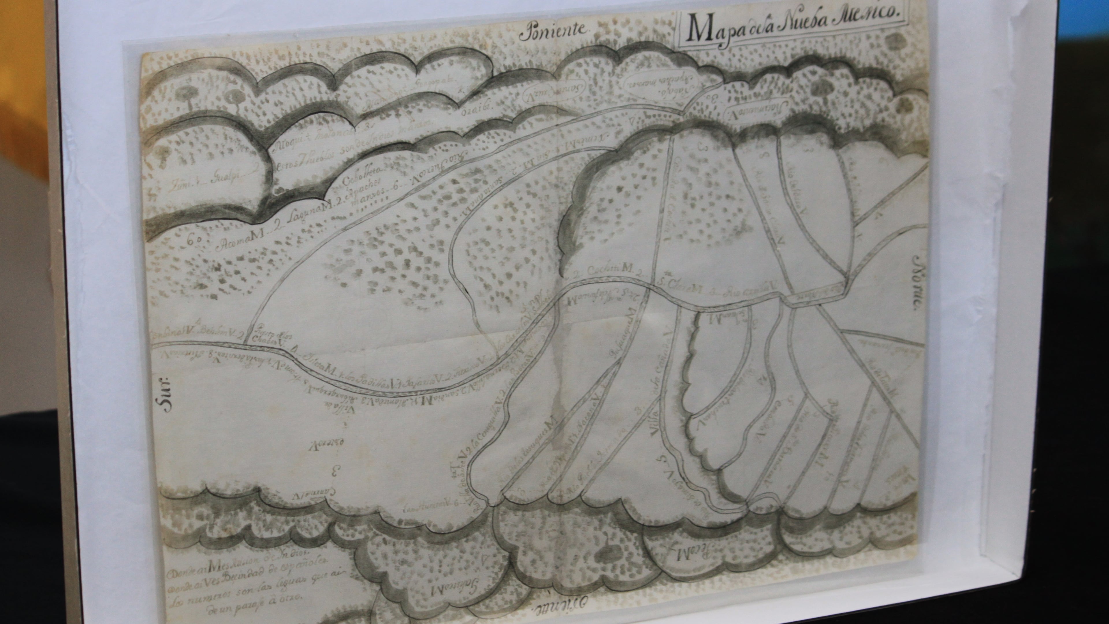 A centuries-old map is displayed at a ceremony marking its return to Mexico's national archives in Albuquerque, New Mexico, on Tuesday, Sept. 23, 2025. (AP Photo/Susan Montoya Bryan)