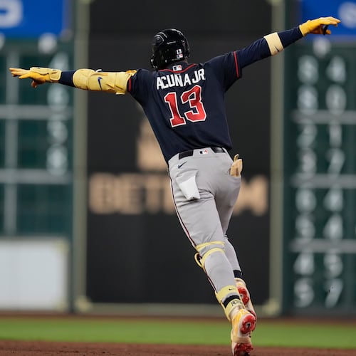 Atlanta Braves' Ronald Acuña Jr. celebrates after hitting a home run during the seventh inning of a baseball game against the Houston Astros in Houston, Friday, Sept. 18, 2026. (AP Photo/Ashley Landis)