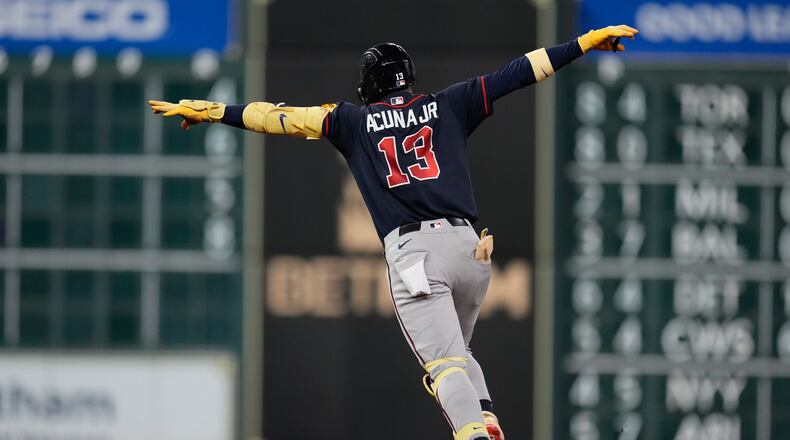 Atlanta Braves' Ronald Acuña Jr. celebrates after hitting a home run during the seventh inning of a baseball game against the Houston Astros in Houston, Friday, Sept. 18, 2026. (AP Photo/Ashley Landis)