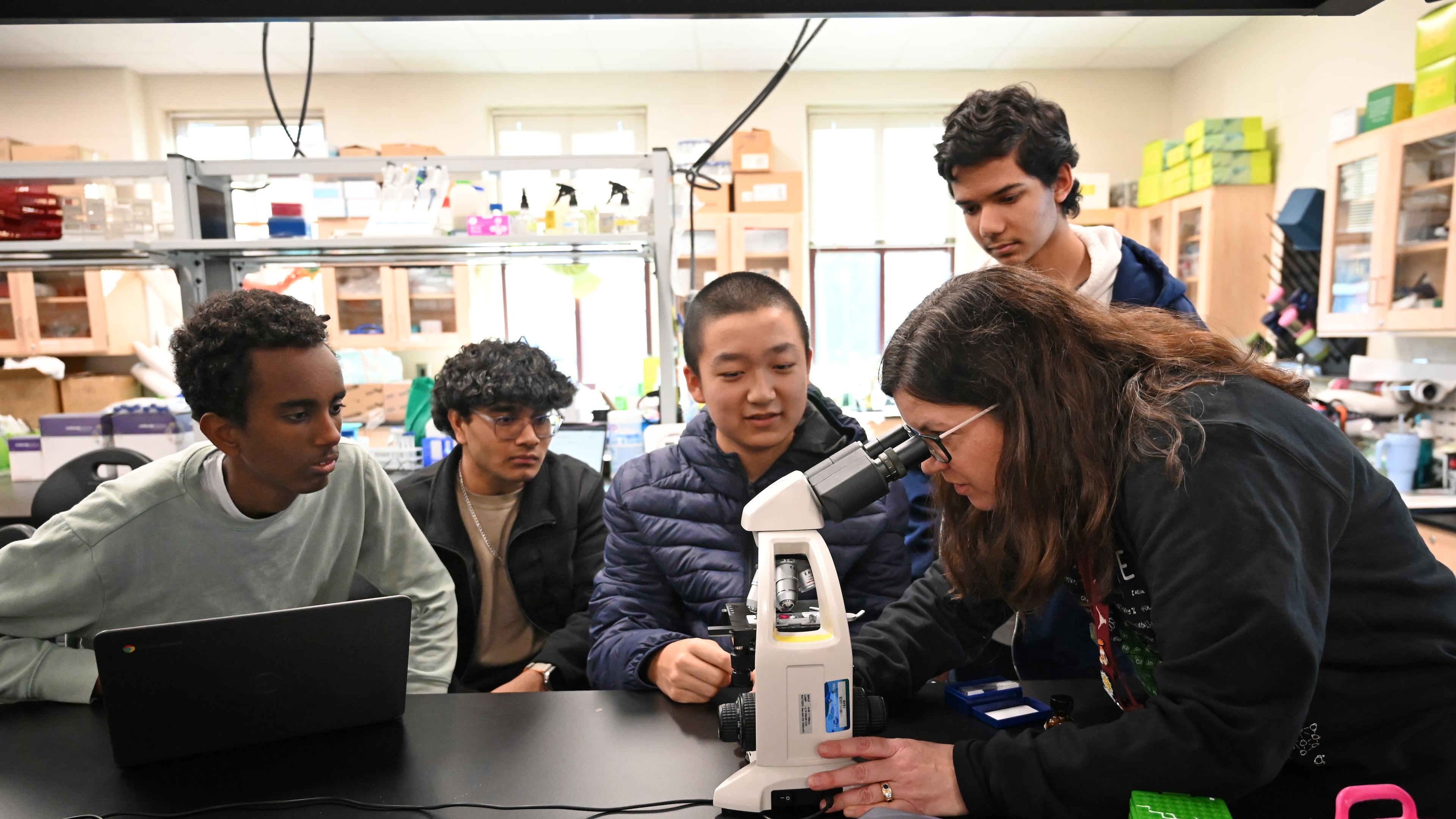 Kate Sharer, Biotechnology Teacher and iGEM Advisor, instructs her students at Lambert High School in Forsyth County in December 2024. Forsyth County Schools had the highest average ACT composite score of any district in Georgia for the graduating class of 2025. (Hyosub Shin/AJC)