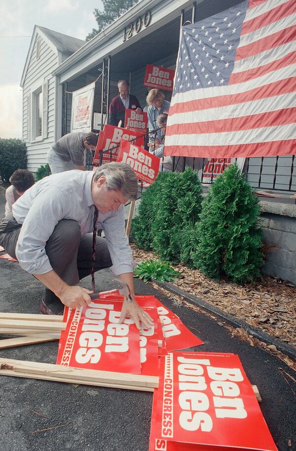 Ben Jones, Democratic candidate for Georgia's 6th Congressional District, assembles campaign signs outside his headquarters in Roswell in October 1994. (Leita Cowart/AP)
