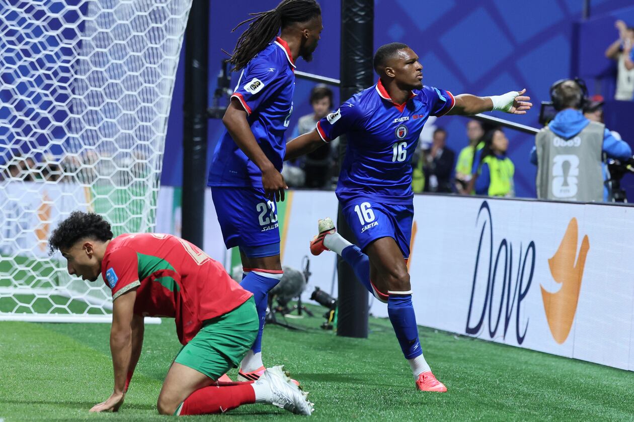 Haiti's Lenny Joseph (right), with teammate Jean-Kevin Duverne (center), celebrates his team's first goal in the 2026 World Cup and first in World Cup competition in 52 years, as Morocco's Anass Salah Eddine is dejected during the Morocco vs. Haiti Group C FIFA World Cup match in Atlanta, on Wednesday, June 24, 2026. (Jason Getz/AJC)