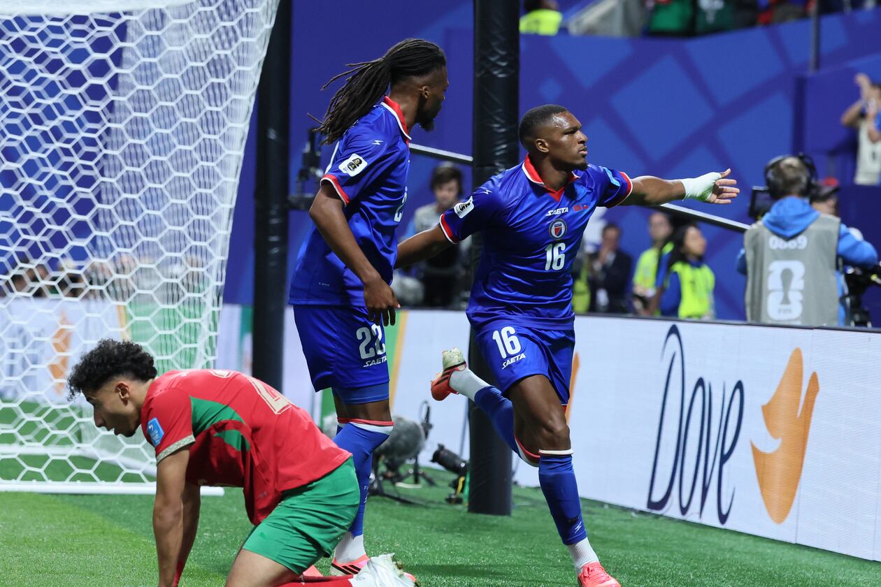 Haiti's Lenny Joseph, right, and teammate Jean-Kevin Duverne, left, celebrates his team's first goal in the 2026 World Cup and first in World Cup competition 52 years, as Morocco's Anass Salah Eddine is dejected, during first half of Morocco vs. Haiti Group C FIFA World Cup match at Atlanta Stadium (Mercedes-Benz Stadium) on Wednesday, June 24, 2026. (Jason Getz/AJC)
