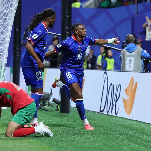 Haiti's Lenny Joseph (right), with teammate Jean-Kevin Duverne (center), celebrates his team's first goal in the 2026 World Cup and first in World Cup competition in 52 years, as Morocco's Anass Salah Eddine is dejected during the Morocco vs. Haiti Group C FIFA World Cup match in Atlanta, on Wednesday, June 24, 2026. (Jason Getz/AJC)