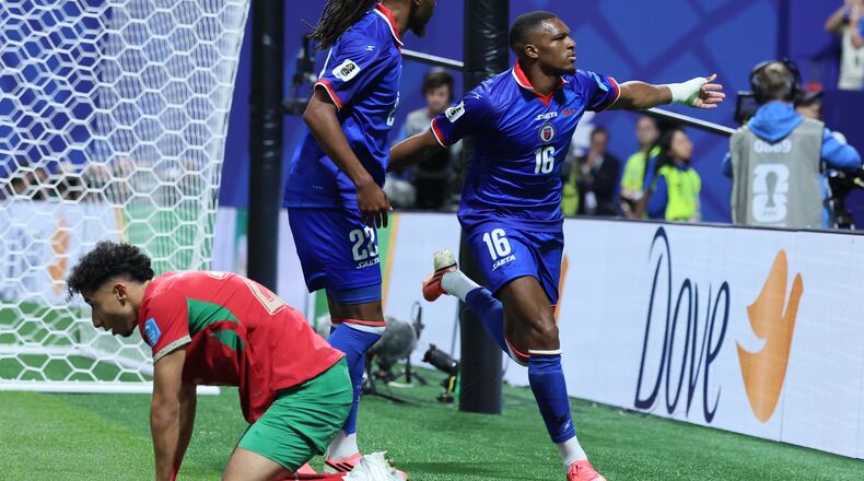 Haiti's Lenny Joseph (right), with teammate Jean-Kevin Duverne (center), celebrates his team's first goal in the 2026 World Cup and first in World Cup competition in 52 years, as Morocco's Anass Salah Eddine is dejected during the Morocco vs. Haiti Group C FIFA World Cup match in Atlanta, on Wednesday, June 24, 2026. (Jason Getz/AJC)