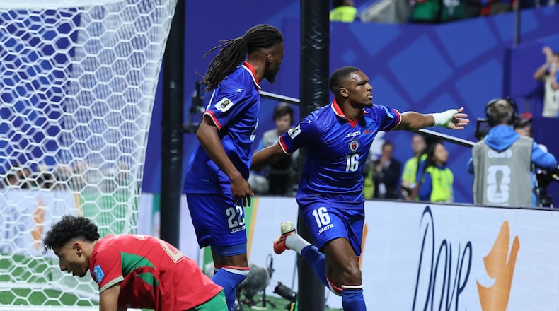 Haiti's Lenny Joseph, right, and teammate Jean-Kevin Duverne, left, celebrates his team's first goal in the 2026 World Cup and first in World Cup competition 52 years, as Morocco's Anass Salah Eddine is dejected, during first half of Morocco vs. Haiti Group C FIFA World Cup match at Atlanta Stadium (Mercedes-Benz Stadium) on Wednesday, June 24, 2026. (Jason Getz/AJC)