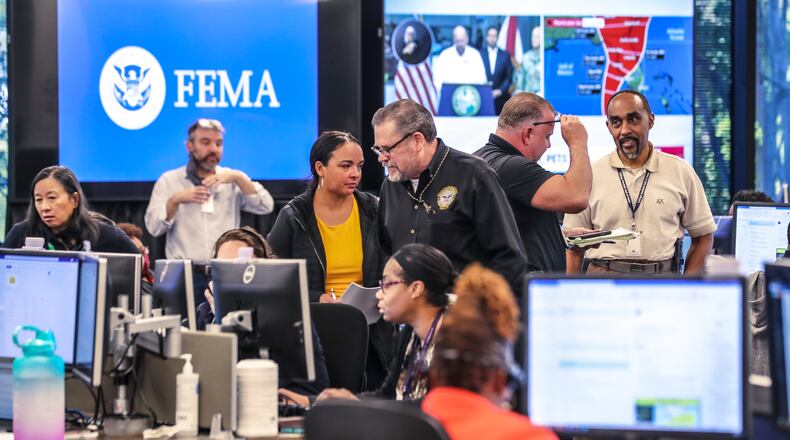 September 27, 2022 DeKalb County: The FEMA Regional Response Coordination Center located in DeKalb County was in full swing on Tuesday, Sept. 27, 2022. Deputy Regional Administrator of FEMA Region 4, Robert Samaan said commodities and resources are staged and ready to go. North Georgia remained Tuesday on the dry side of Hurricane Ian, which is a major Category 3 storm and continues to strengthen as it barrels toward the Gulf Coast. Ian made landfall early Tuesday morning on the west coast of Cuba with sustained winds of 125 mph. According to the latest storm track predictions, it is expected to become a Category 4 hurricane as it moves across the Gulf of Mexico, and it will likely lose some steam as it approaches the west coast of Florida on Wednesday. The National Hurricane Center on Tuesday issued tropical storm warnings for Camden and Glynn counties along the Georgia coast, which include the sea islands. Those areas are urged to plan for tropical storm-force winds beginning Thursday evening, with sustained winds up to 40 mph and gusts up to 65 mph possible. Storm surge and tropical storm watches remain in effect for other areas of coastal Georgia, including Bryan, Effingham, Chatham, Charlton, Liberty, Long, McIntosh and Wayne counties. Channel 2 Action News meteorologist Brian Monahan expects Ian will still be a major hurricane on its approach to the U.S. Exactly where along the Florida coast it makes landfall will have a big impact on the weather locally. “We’ll watch the track closely,” Monahan said. “The farther south Ian makes landfall in Florida, the less rain we would see here. Still, the potential for 1 to 2, or even 3 inches of rain or more, over parts of the area.” All that rain will hold off until the end of the week, he said. From Tuesday to Thursday, the weather in North Georgia could not be better. (John Spink / John.Spink@ajc.com)