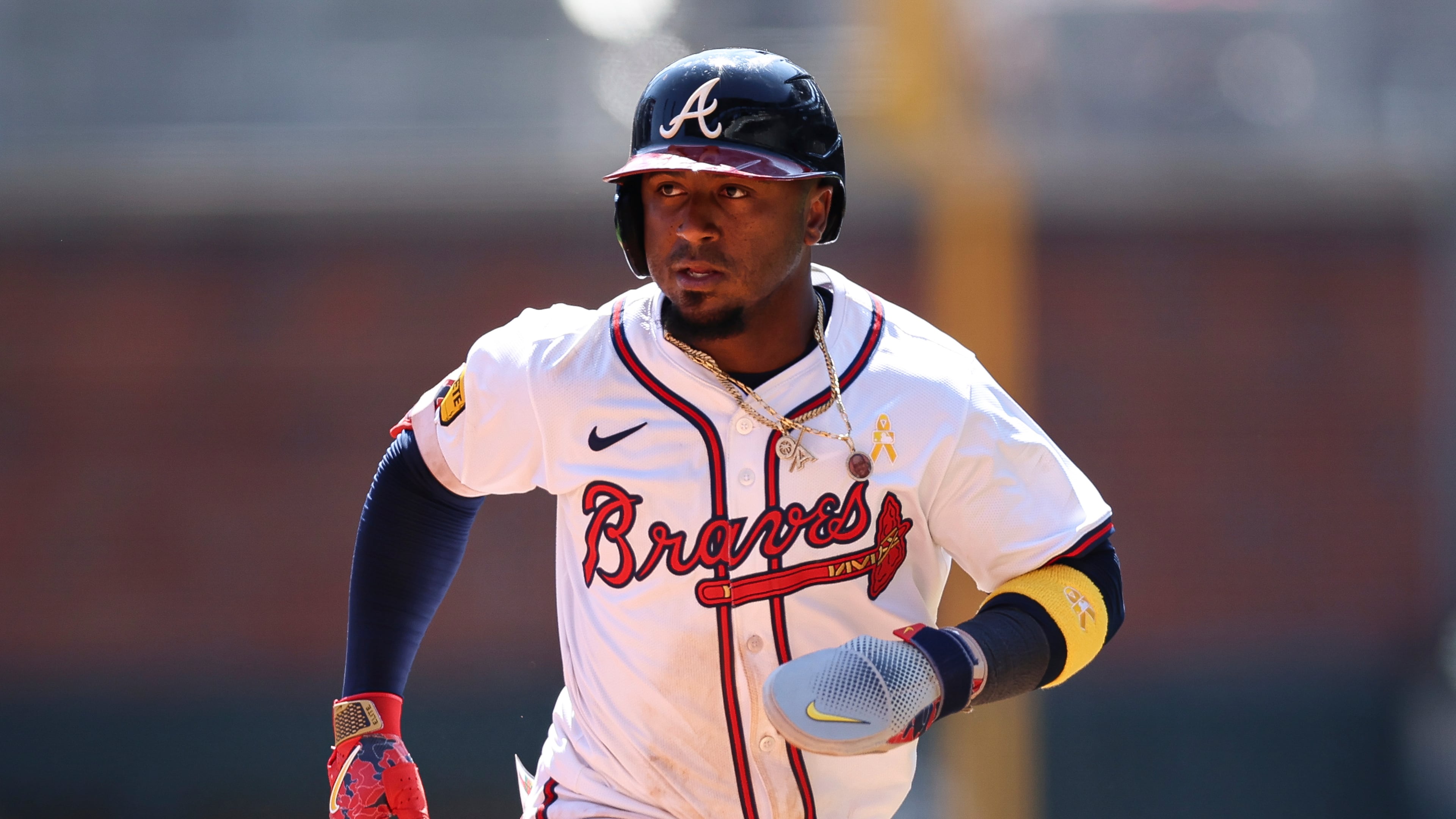 Atlanta Braves' Ozzie Albies heads to third base in the ninth inning of a baseball game against the Seattle Mariners, Sunday, Sept. 7, 2025, in Atlanta. (AP Photo/Colin Hubbard)