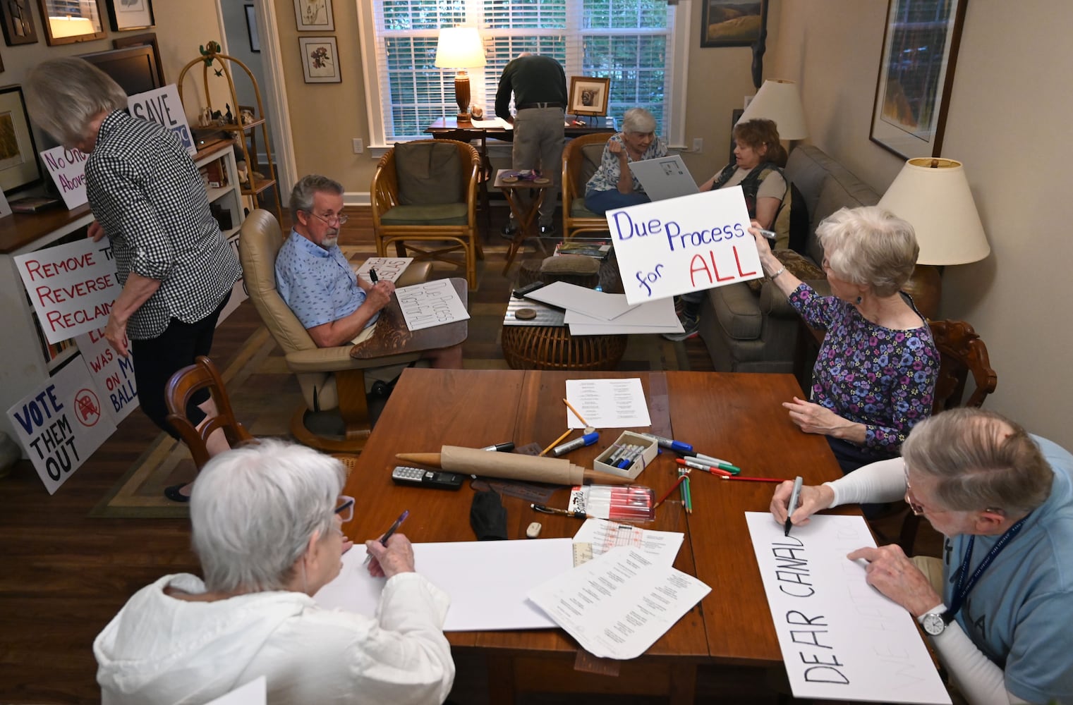 Wheelchairs and walkers won’t stop these seniors from taking a stand against Trump