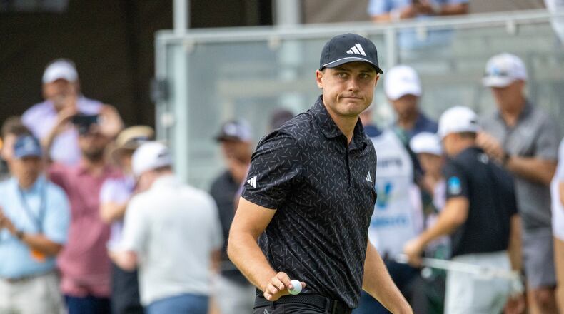 Ludvig Aberg waves to fans during the second round of the Valero Texas Open golf tournament in San Antonio, Friday, April 3, 2026. (Andrew J. Whitaker/The San Antonio Express-News via AP)