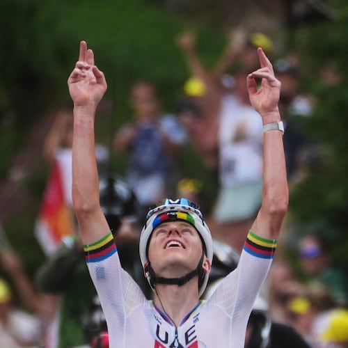Slovenia's Tadej Pogacar celebrates as he crosses the finish line to win the sixth stage of the Tour de France cycling race with start in Pau and finish in Gavarnie-Gedre, France, Thursday, July 9, 2026. (AP Photo/Thibault Camus)