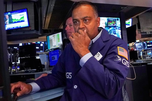 Specialist Dilip Patel works on the floor of the New York Stock Exchange, Tuesday, July 8, 2025. (AP Photo/Richard Drew)