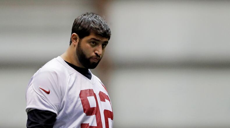 Atlanta Falcons' Joe Vellano walks on the field during a workout at the NFL football team's practice facility in Flowery Branch, Ga., Friday, Jan. 27, 2017. (AP Photo/David Goldman)