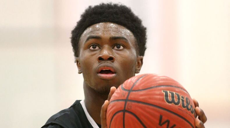Wheeler's Jaylen Brown attempts a free throw in a game against North Gwinnett on February 27, 2014. Jason Getz / Special to the AJC Wheeler's Jaylen Brown. ( Jason Getz / Special to AJC)