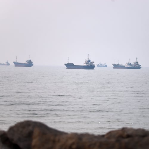 Commercial vessels are seen in the Strait of Hormuz off Bandar Abbas, Iran, Tuesday, June 30, 2026. (Amirhosein Khorgooi/ISNA via AP)