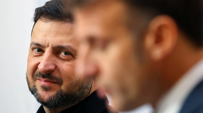 Ukrainian President Volodymyr Zelenskyy, left, and French President Emmanuel Macron, attend a joint press conference at the Elysee Palace in Paris, Monday, Nov. 17, 2025. (Sarah Meyssonnier, Pool Photo via AP)