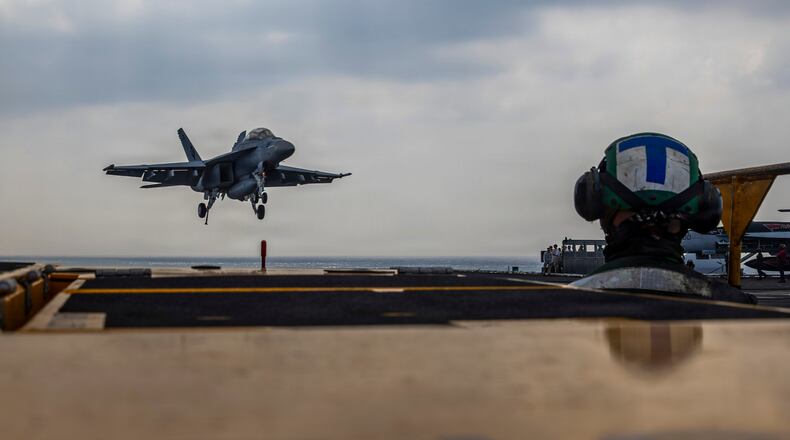This photo provided by the U.S. Navy shows a Boeing F/A-18E Super Hornet landing on the Nimitz-class aircraft carrier USS Abraham Lincoln in the Indian Ocean on Jan. 22, 2026. (Mass Communication Specialist Seaman Daniel Kimmelman/U.S. Navy via AP)