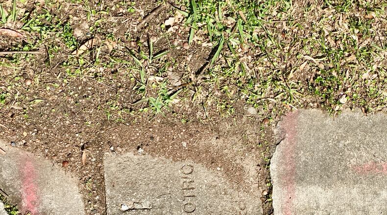 One of 254 “trip hazards” on West Ponce De Leon Ave. sidewalks through downtown Decatur slated for sawing and smoothing later this year. Bill Banks for the AJC