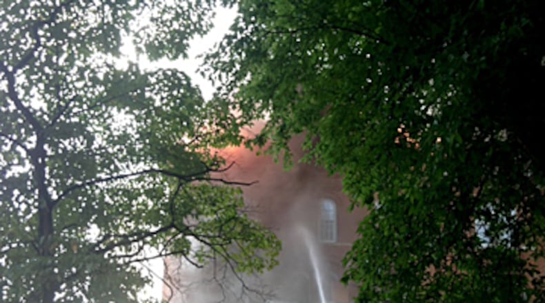 Atlanta firefighters are battling a blaze at an abandoned building at Morris Brown College.