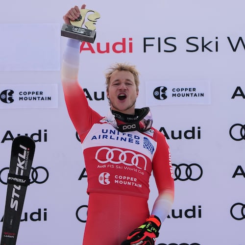 Switzerland's Marco Odermatt celebrates after winning a World Cup men's super-G skiing race, Thursday, Nov. 27, 2025, in Copper Mountain. (AP Photo/John Locher)